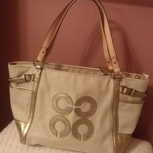 Coach purse with gold accents